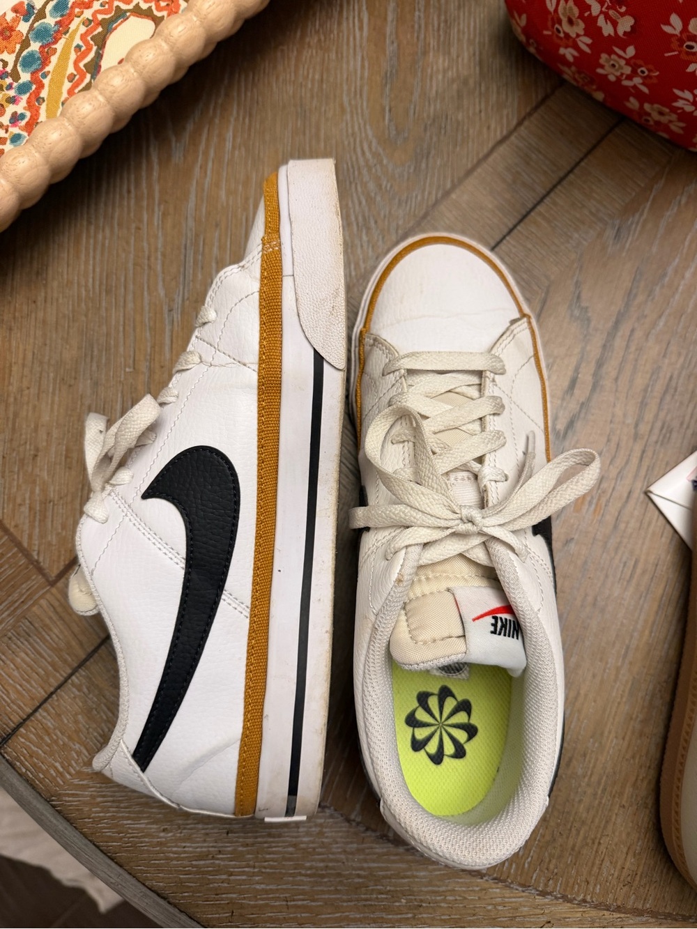 Nike Court Legacy Sneakers with Black Swoosh and Gold Stripe